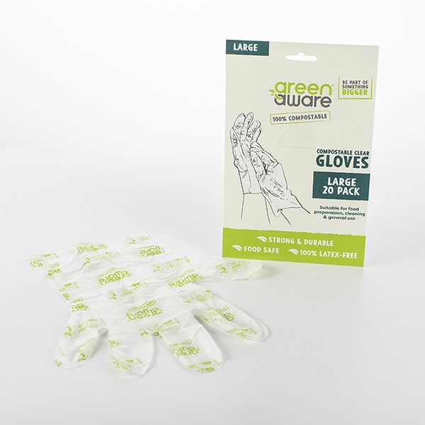 20 pack of large clear gloves with a pair of clear gloves lying in front