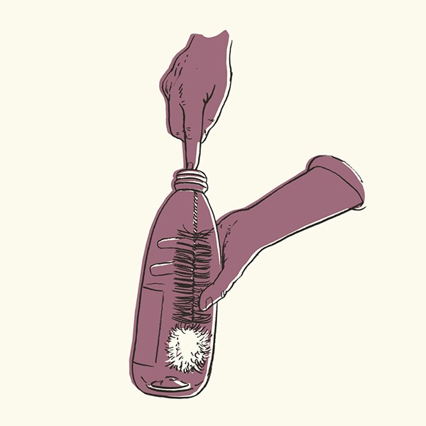 Illustration of the bottle brush cleaning the inside of a bottle